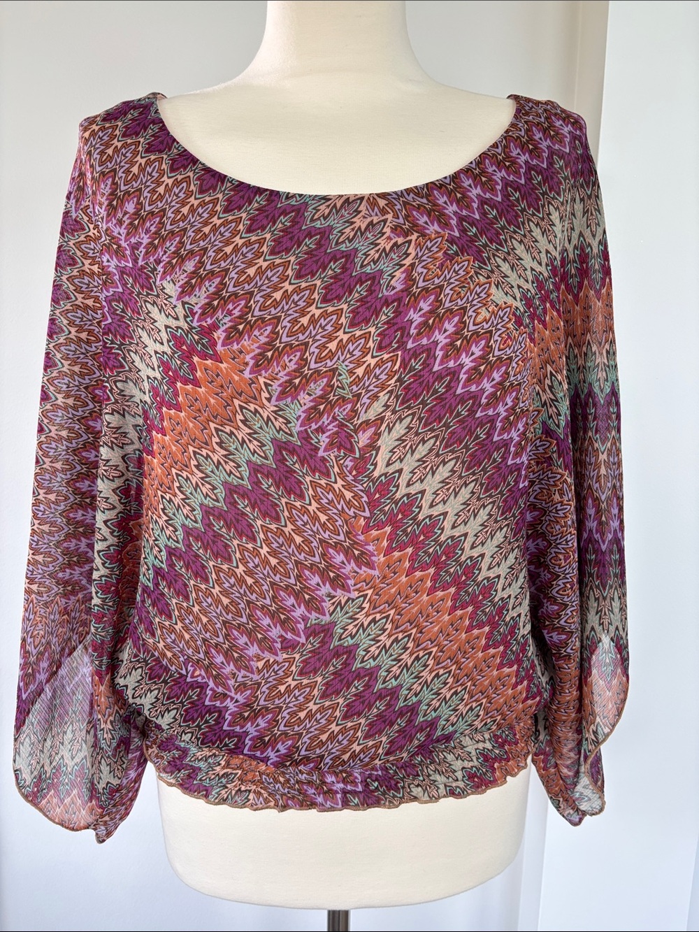 Pretty top with sheer butterfly sleeves